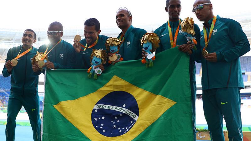 Gold medalist Diogo Ualisson Jeronimo da Silva, Gustavo Henrique Araujo, Daniel Silva, Heitor de Oliveira Sales, Felipe Gomes and Jonas de Lima Silva of Brazil pose on the podium