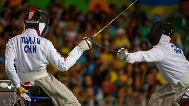 Jianquan Tian CHN (left) vs Gang Sun CHN in the Men's Individual Épée - Category A Semi-final Wheelchair Fencing in the Carioca Arena 3 at the Rio 2016 Paralympic Games.
