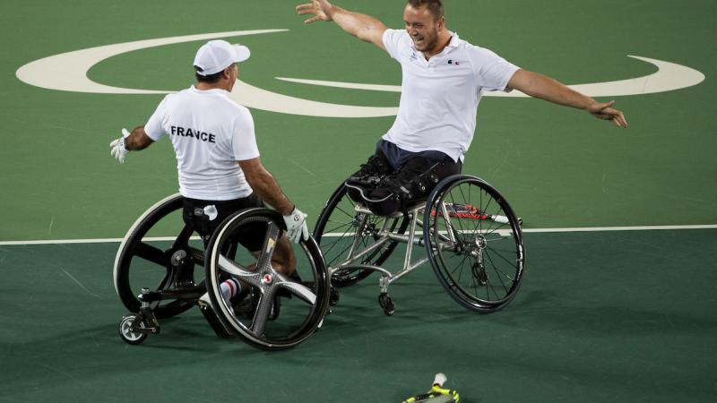 Stephane Houdet FRA (left) and Nicolas Peifer FRA celebrate as they win the Gold Medal Match against Alfie Hewett GBR and Gordon Reid GBR in the Men's Doubles Gold Medal Match