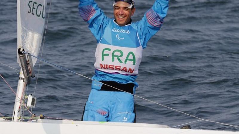 Damien Seguin celebrates winning sailing gold in Rio de Janeiro