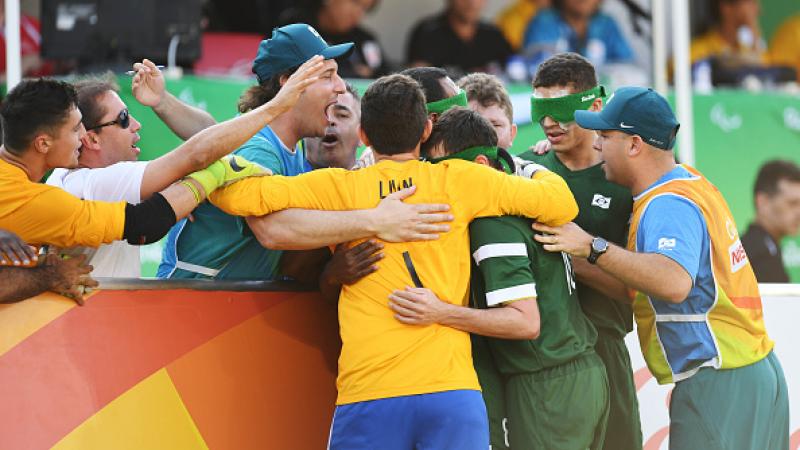 Ricardinho of Brazil and his team mates celebrate after scoring a goal in the men's football 5-a-side