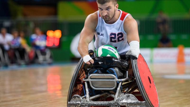 Kory Puderbaugh USA with the ball in the centre of the pitch. Mixed - Pool Phase Group B, Match 021. Wheelchair Rugby at the Rio 2016 Paralympic Games.