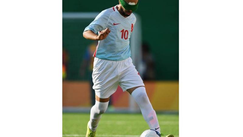 Celal Coban of Turkey runs with the ball in the men's football 5-a-side during the Rio 2016 Paralympic Games.