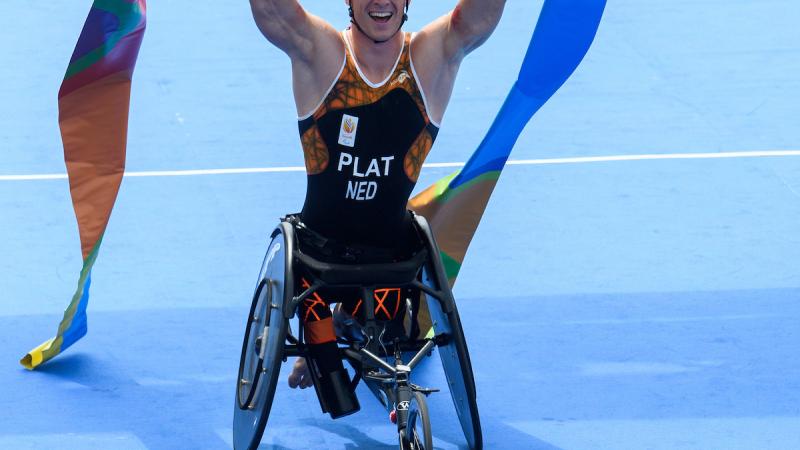 Jetze Plat NED celebrates winning the Gold Medal in the Men's PT1 Triathlon at Fort Copacabana. The Paralympic Games, Rio de Janeiro