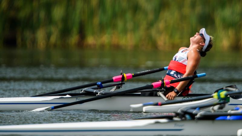 Woman in rowing boat on the water