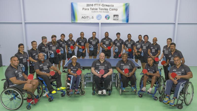 Participants of Para table tennis camp pose for the photo.