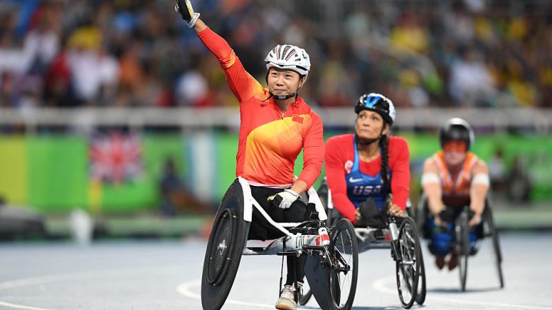 Wenjun Liu of China celebrates after winning the women's 100m - T54 final on day 2 of the Rio 2016 Paralympic Games