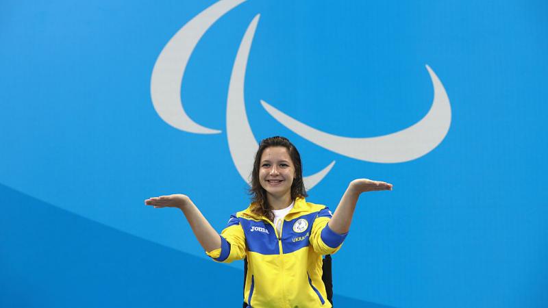 Gold medallist Yelyzaveta Mereshko of Ukraine celebrates on the podium at the medal ceremony for the Women's 100m Freestyle - S6 on day 10 of the Rio 2016 Paralympic Games