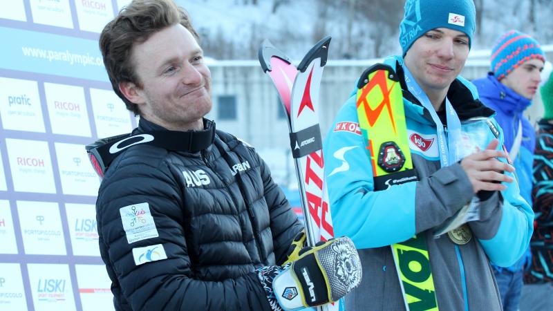 a Para skier smiles with his skies