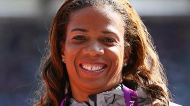 A picture of a woman's portrait showing her bronze medal