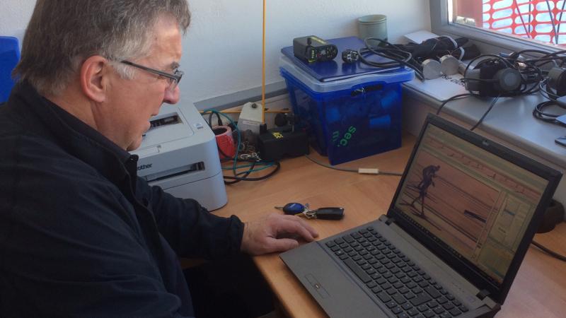 Man sitting in front of a computer