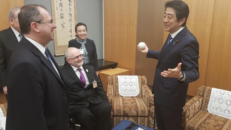 Japan's Prime Minister Abe chats with IPC President Sir Philip Craven and IPC CEO Xavier Gonzalez during a meeting in February 2017.