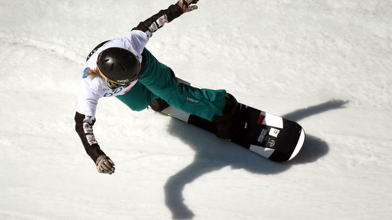 Woman on a snowboard in action