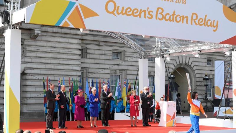 Retired cyclist Anna Mears from Australia carries the baton after receiving it from Queen Elizabeth during the launch of The Queen's Baton Relay for the XXI Commonwealth Games being held on the Gold Coast in 2018 at Buckingham Palace.