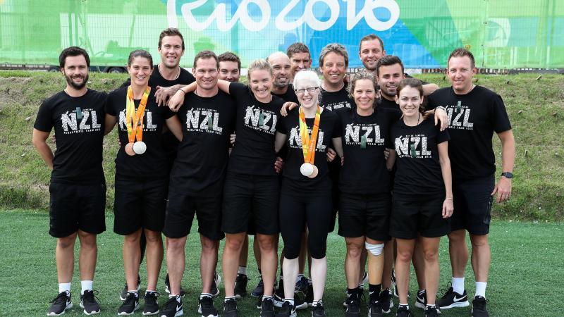 Group of Para cyclists gather together for a photo during the Rio 2016 Paralympics