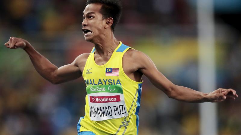 Malaysia's Mohamad Ridzuan Puzi reacts after victory in the men's 100m T36 final at the Rio 2016 Paralympic Games.