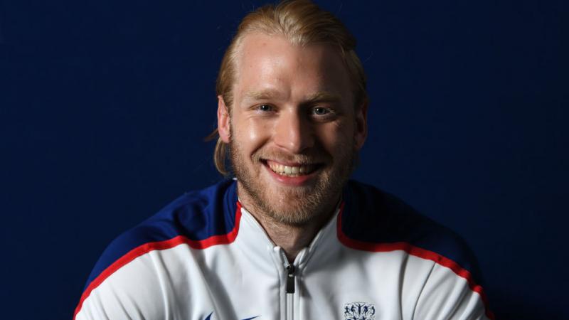 Jonnie Peacock smiles for the camera at team announcement for London 2017