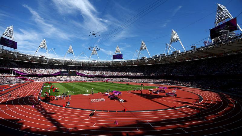 a wide shot of a stadium with fans watching