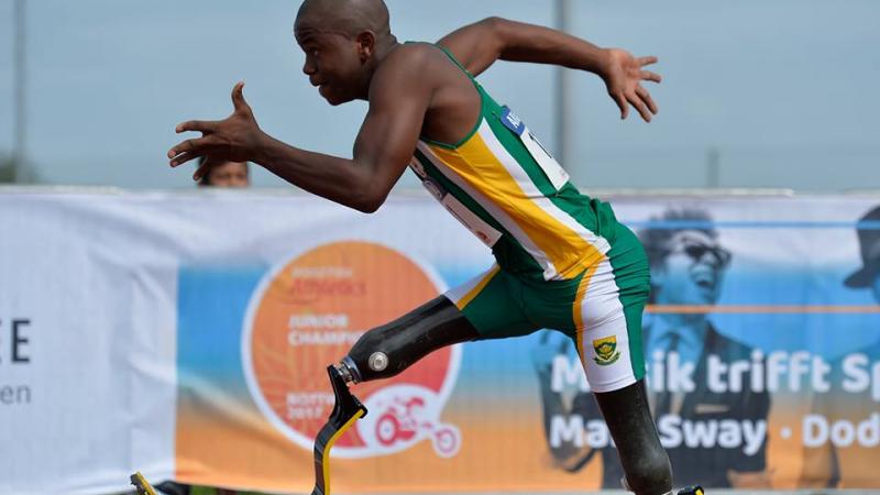 Man with double blades sprints