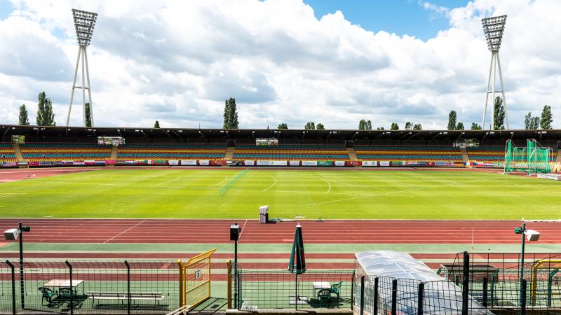 a wide shot of an empty athletics stadium