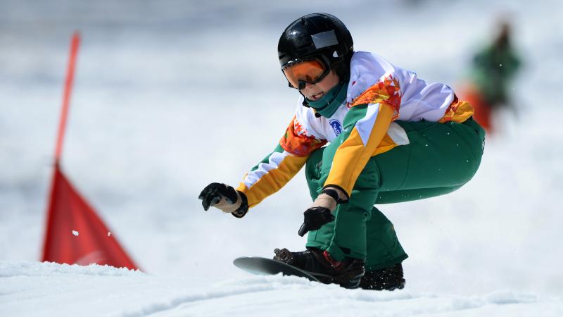 a male Para snowboarder