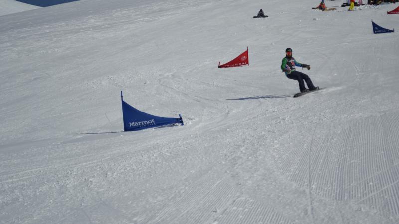 a Para snowboarder on the slopes