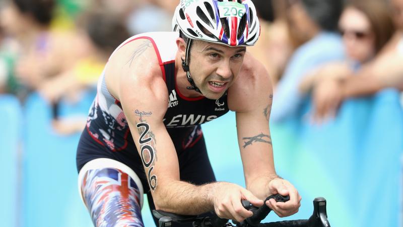 a male Para triathlete on his bike