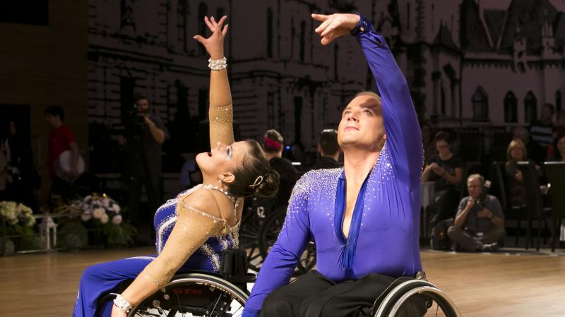 Two dancers in a wheelchair performing