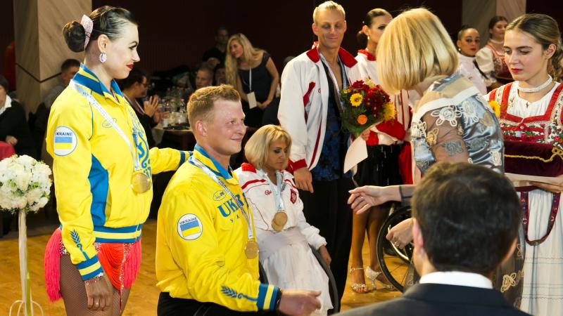 a Para dancer receives his medal