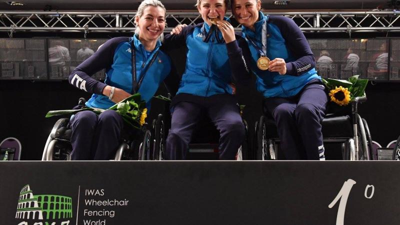 Italy's women celebrate foil gold at the 2017 IWAS Wheelchair Fencing World Championships.