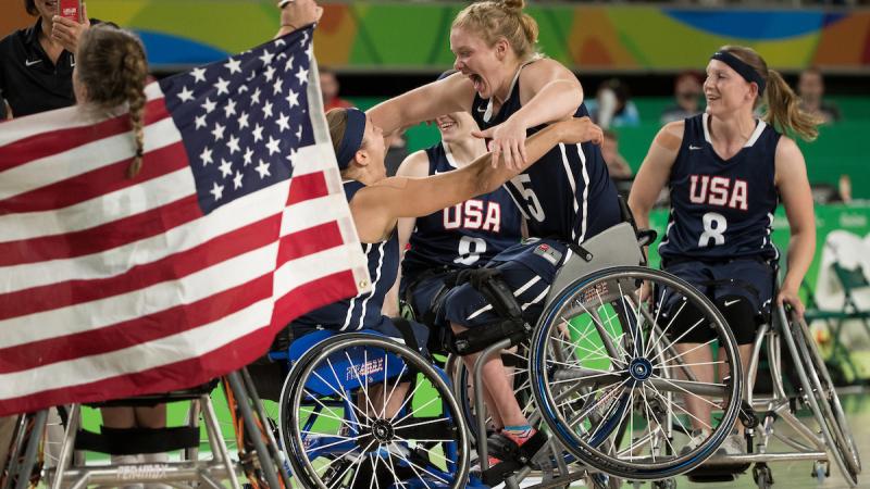 US women wheelchair basketball players celebrating
