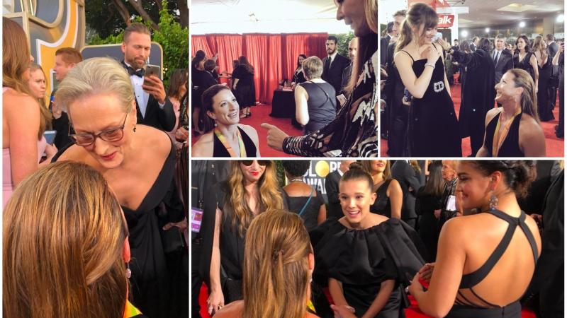 a female wheelchair athlete with actors on the red carpet