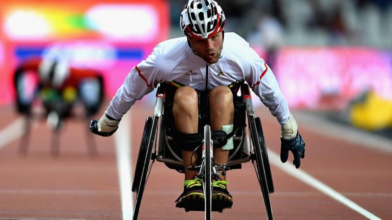 Peter Genyn of Belgium crosses the line to win the Mens 100m T51 final at London 2017 World Para Athletics Championships.