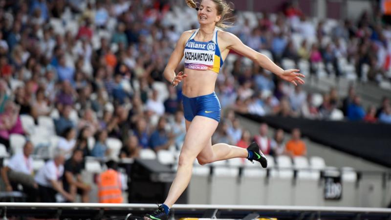 Leilia Adzhametova of Ukraine crosses the line to win the Women's 400m T13 Final at the London 2017 World Para Athletics Championships.