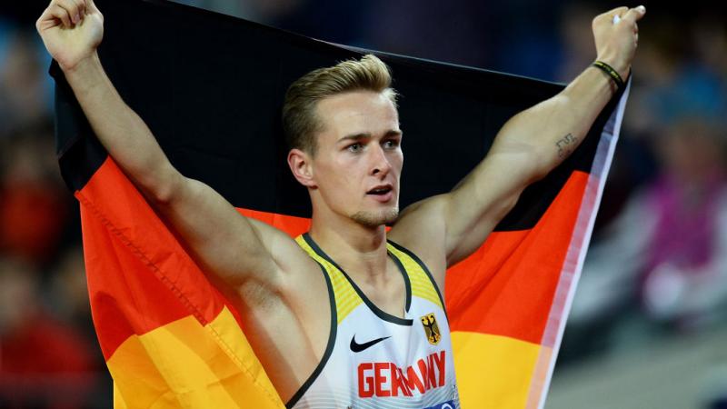 Johannes Floors of Germany celebrates after winning gold in the final of the mens 200m T43 at the London 2017 World Para Athletics Championships.