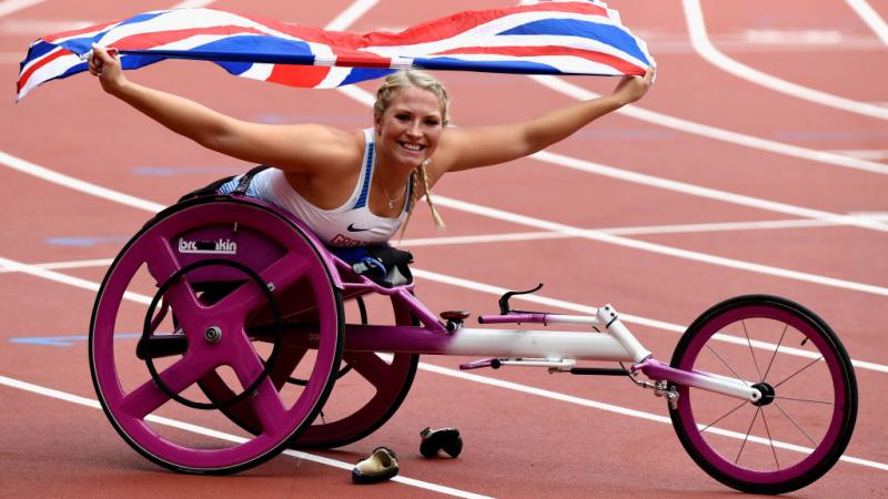 Samantha Kinghorn of Great Britain celebrates after winning gold in the Womens 100m T53 final at the London 2017 World Para Athletics Championships.
