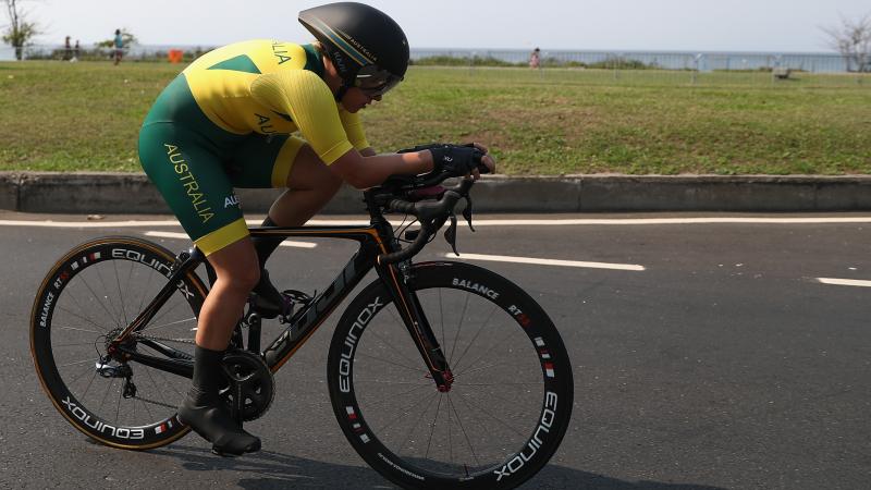 a female Para cyclist on the road