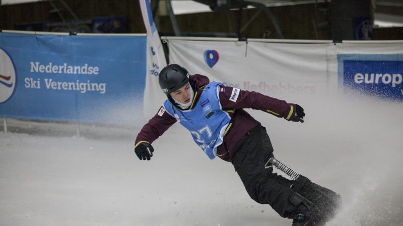 a male Para snowboarder 