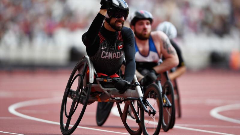 Brent Lakatos of Canada crosses the line to win in the Mens 100m T53 final at the London 2017 Para Athletics Championships.