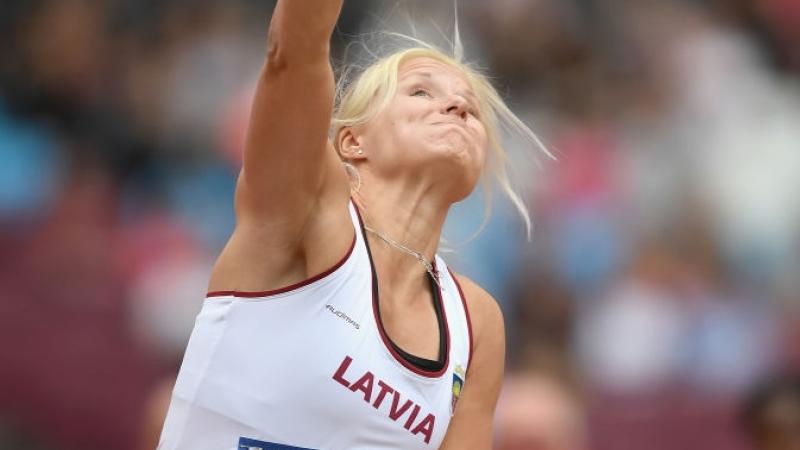 Female Para athlete Diana Dadzite of Latvia throws a shot put 