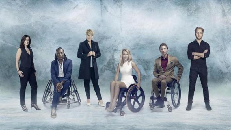 five TV presenters standing in front of a winter backdrop