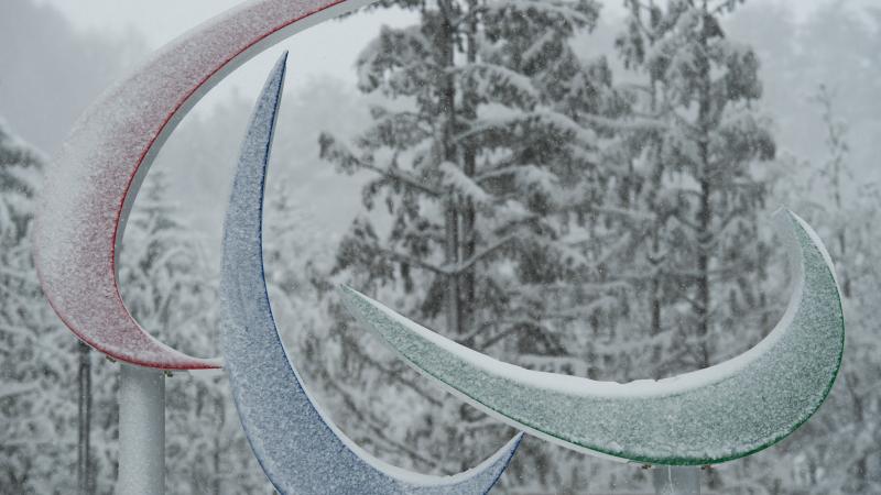 the Agitos symbol covered in snow at the PyeongChang 2018 Paralympic Village