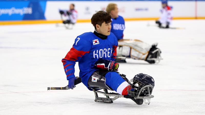 a male Para ice hockey player