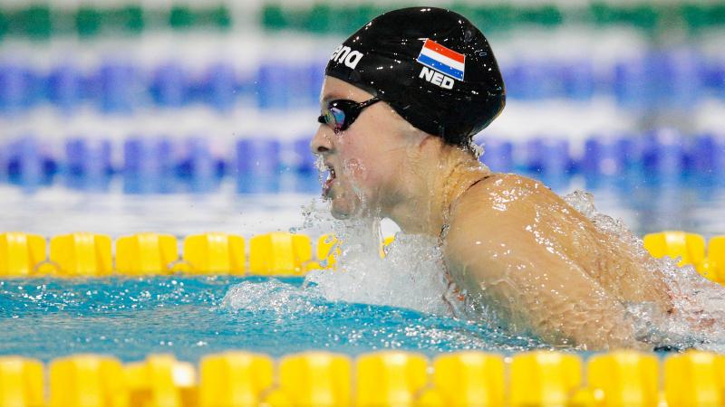 a female Para swimmer in the water