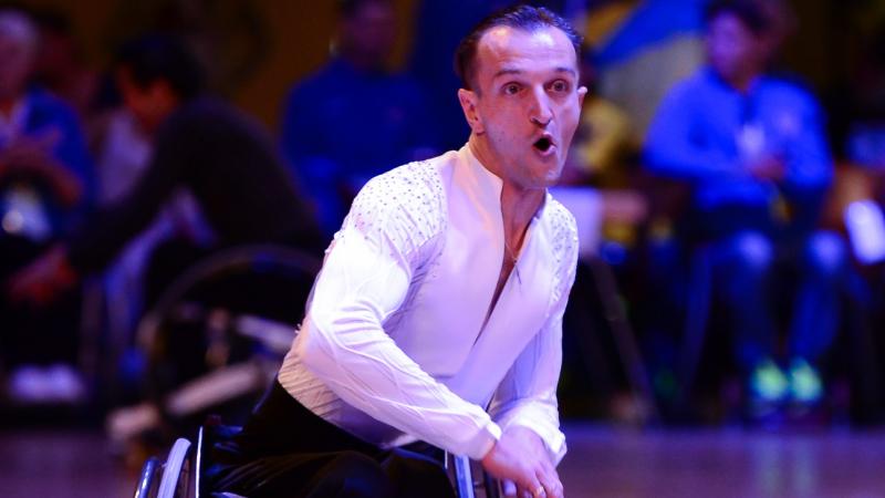 a male wheelchair dancer mid-move