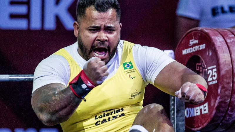 Athlete celebrating in Para powerlifting competition