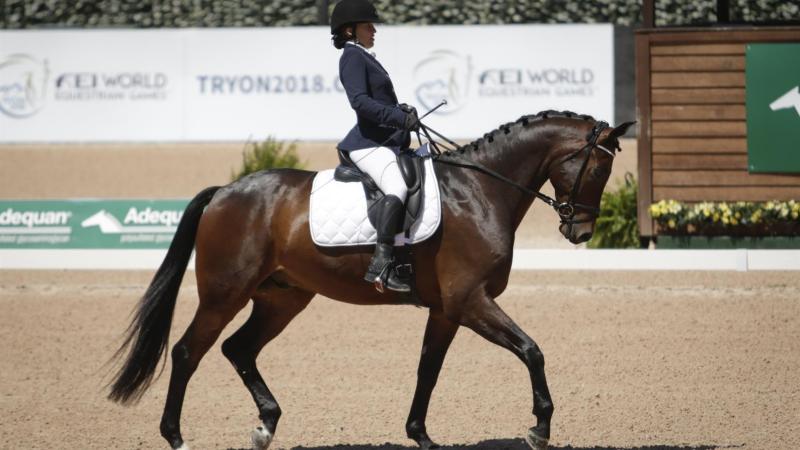 A female Para equestrian rider on her horse