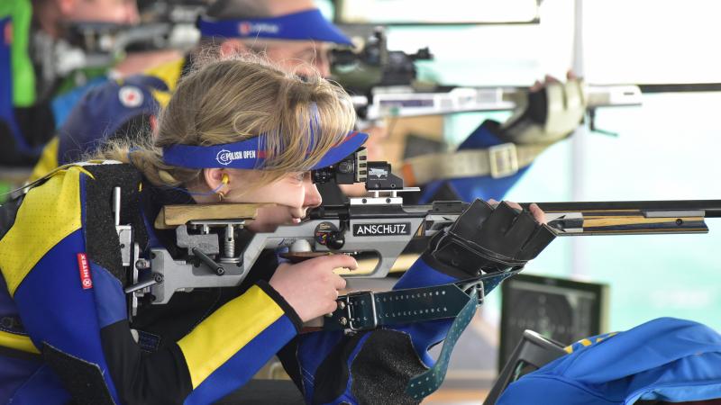 Female shooter in prone position