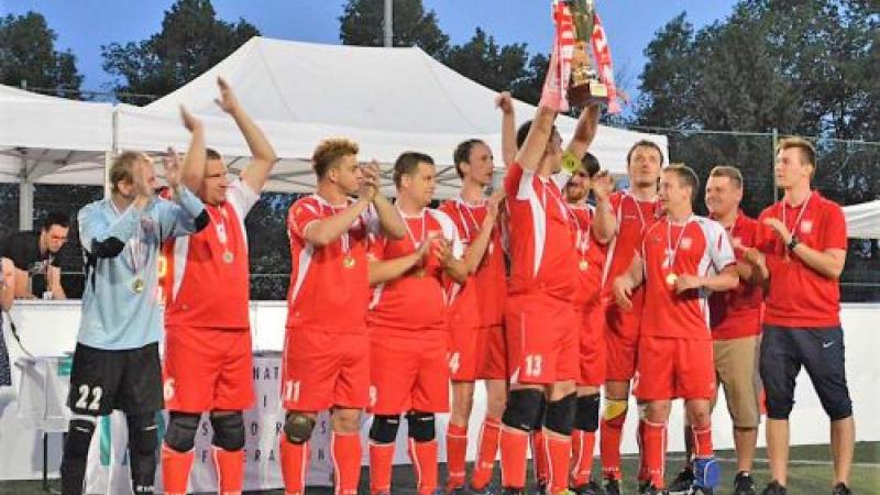 Poland's blind football team celebrates after winning the 2018 Euro Challenge title