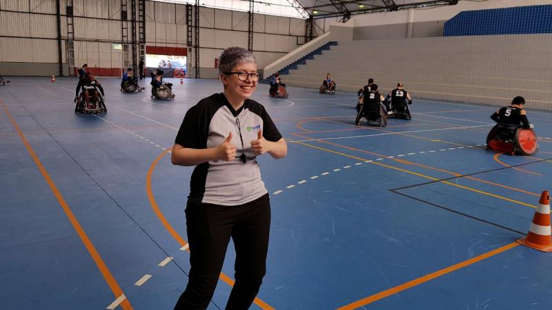 Female referee poses